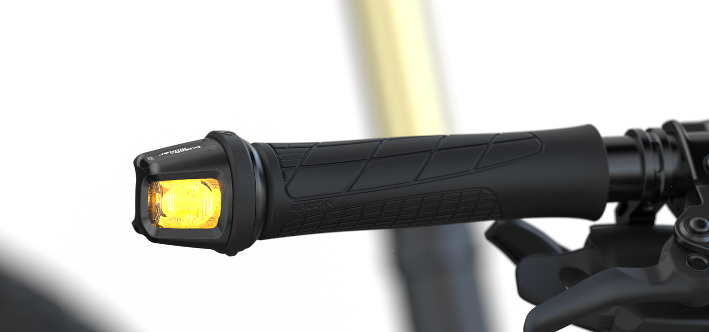 Blinker Titel Ein Fahrradblinker im Lenkerende.